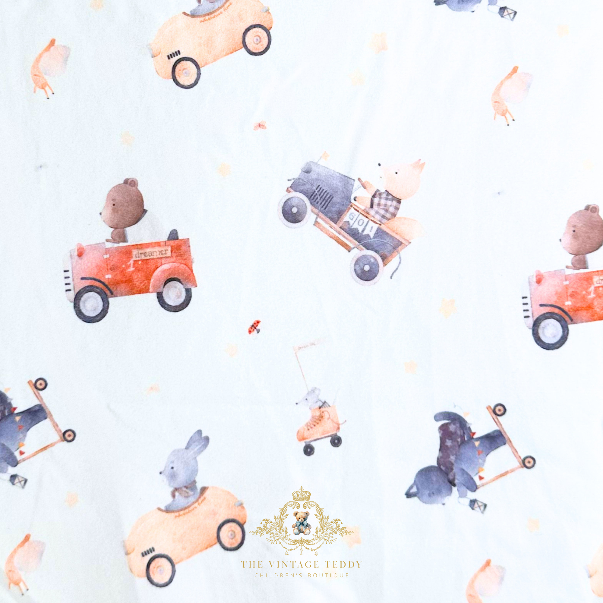Cute pattern of teddy bears and his friends driving vintage cars on a white  fabric background. The Vintage Teddy Children's Boutique Logo. Children's online clothing store.