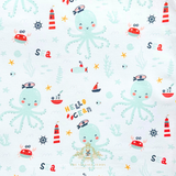 Cute fabric pattern of octopuses, lighthouses, and sea creatures on a off white background for baby one-piece rompers. The Vintage Teddy Children's Boutique Cute Baby & Toddler Clothes for Kids