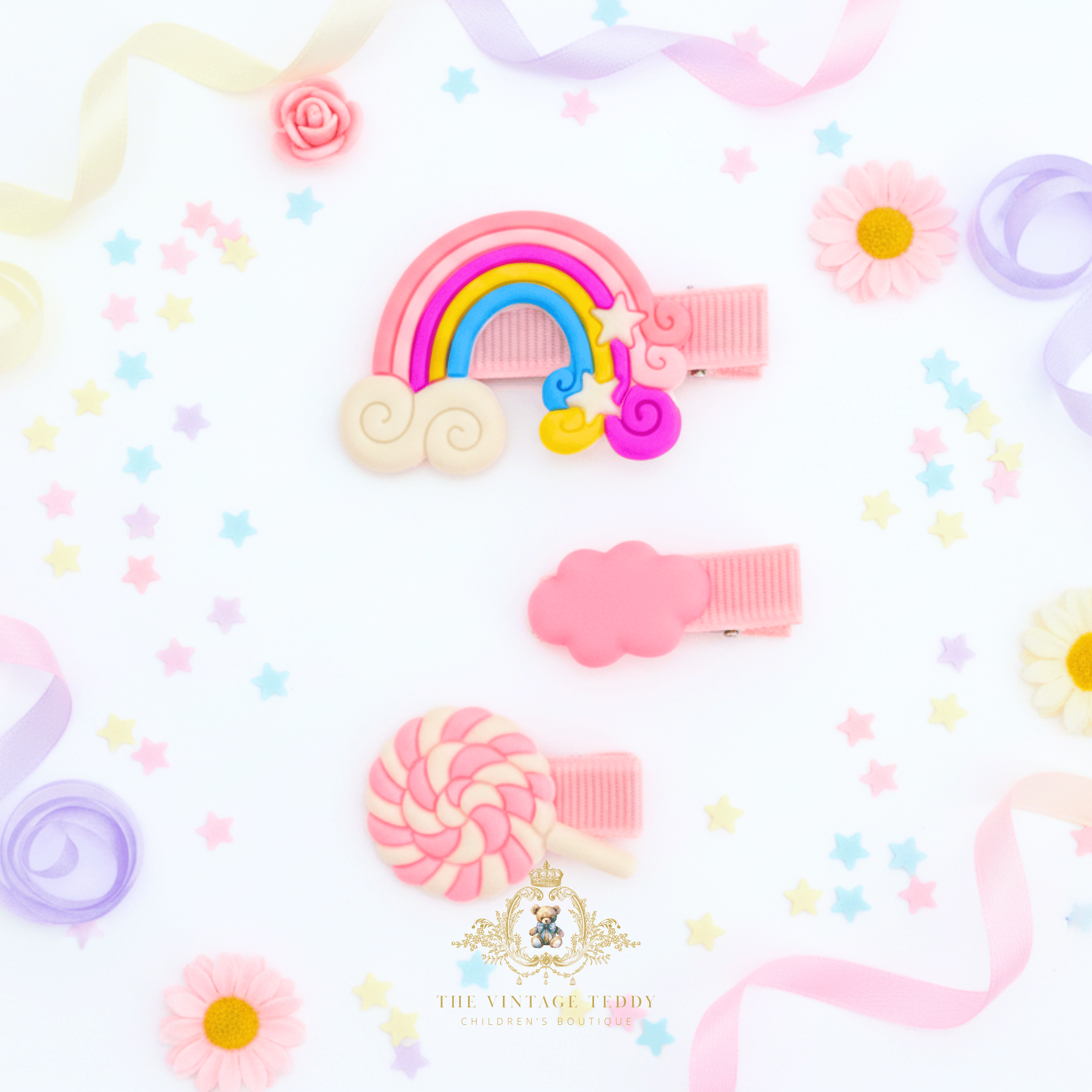 Pink rainbow and lollipop hair clips for girls – flat lay mockup of children's hair accessories from The Vintage Teddy boutique