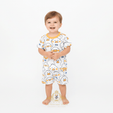 Toddler boy wearing Mr. Duck t-shirt and shorts cute matching set for kids yellow blue white boutique children's clothing