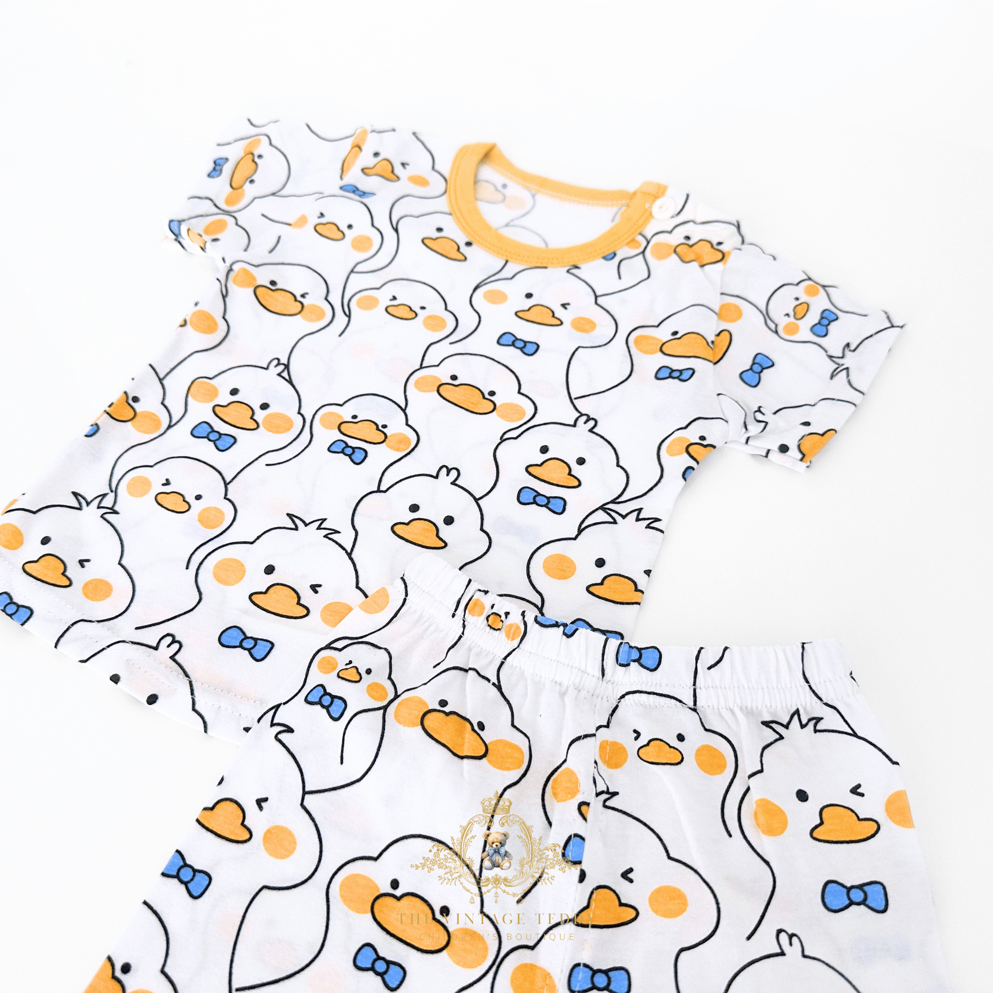 Kids Mr. Duck t-shirt front closeup view yellow blue white 2-piece matching outfit for toddlers boutique kids clothes