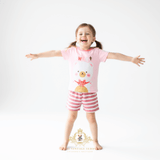 Happy toddler girl wearing Sweet Bear 2-piece matching set girls summer outfit for kids