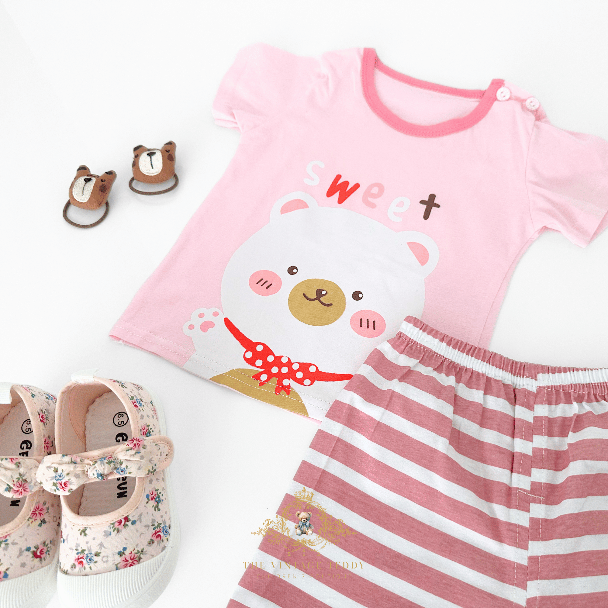 Close up of girls Sweet Bear matching set with kids accessories toddler boutique clothing for girls