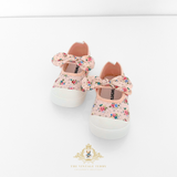 Pair of baby shoes with floral design and bow pink sneakers for girls on a white background, featuring The Vintage Teddy  brand logo.